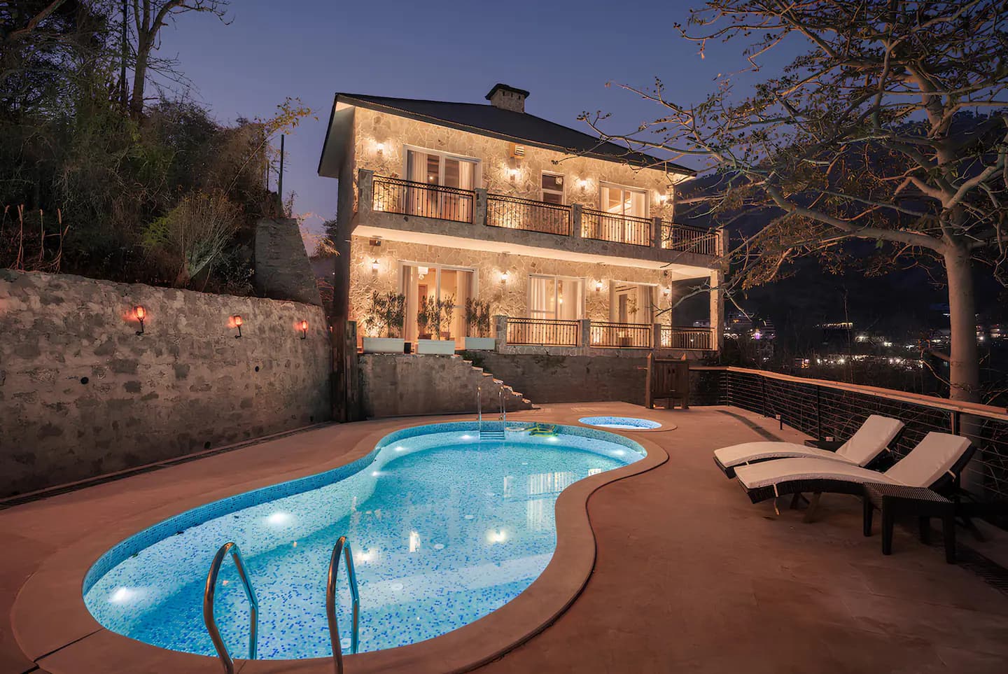Heated swimming pool at Salud Villa with mountain views